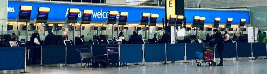 A photograph of IndiGo Airlines airport check-in counter