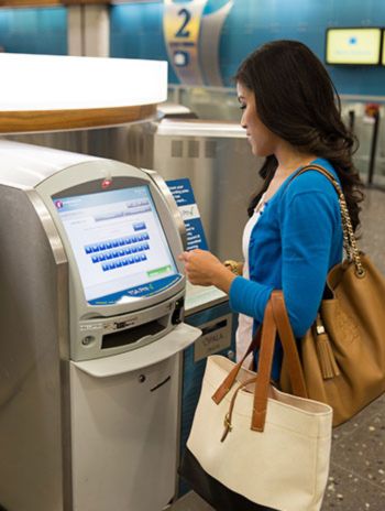 A photograph showing Hawaiian Airlines airport kiosk check-in